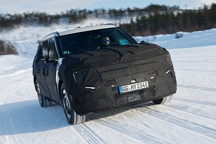Camouflaged Kia EV9 electric SUV undergoes winter testing at proving grounds