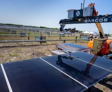 Coverage of solar farms can be achieved in shorter spaces of time using panel laying robots